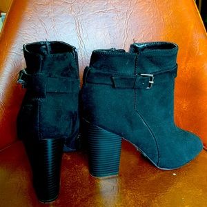 Suede open toed boots.